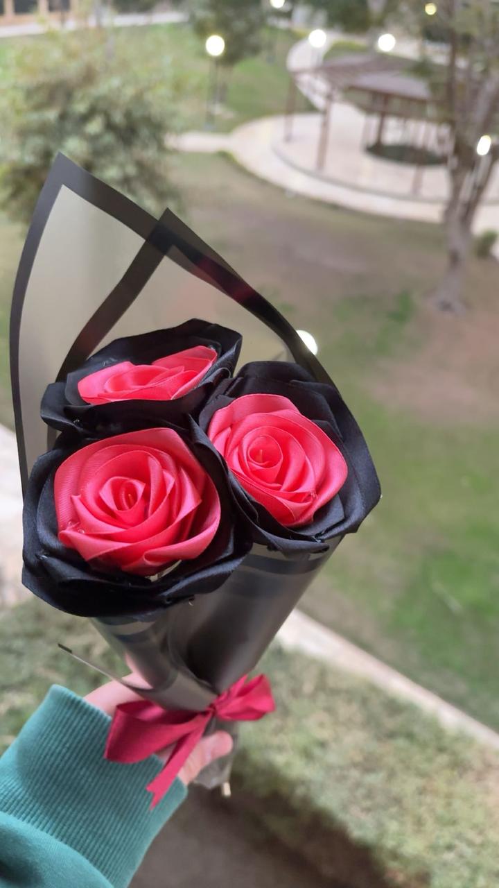 Artificial red and black Roses