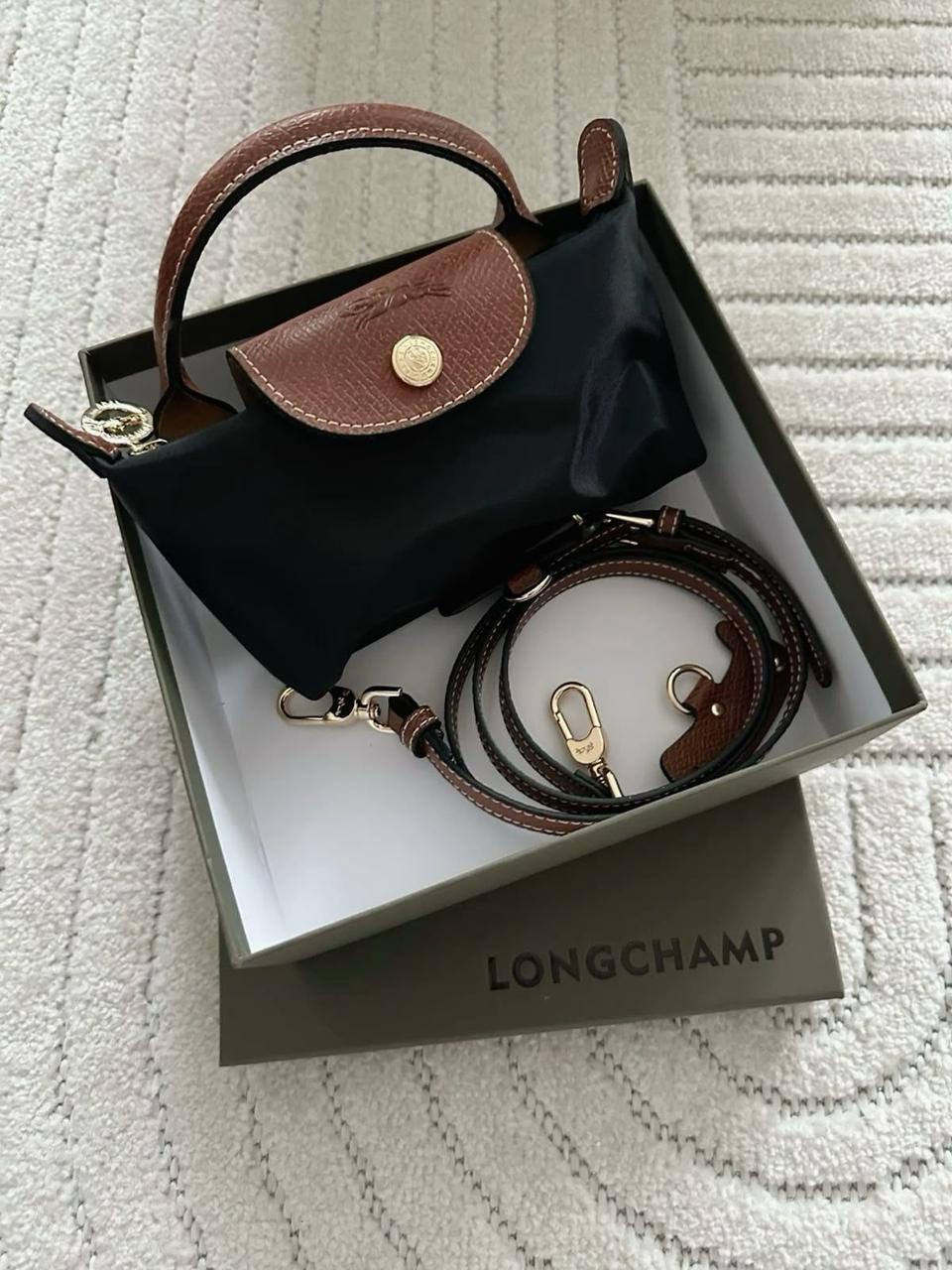 Black Longchamp mirror bags