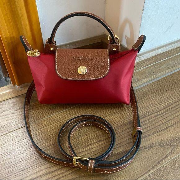 Red Longchamp mirror bags