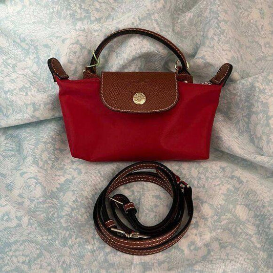 Red Longchamp mirror bags