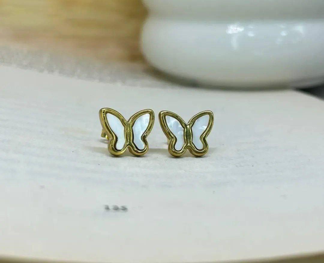 white x gold earrings